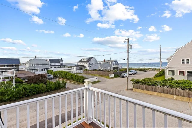 a view of a balcony with city