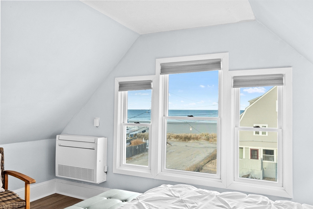 24 Warren Street Hull, MA 02045 - Photo 37 of 41 a bedroom with a bed and a window