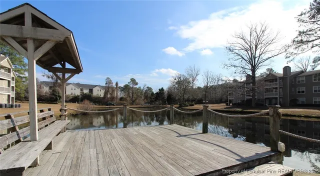 a view of road with house in background