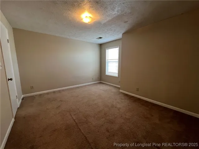 a view of small space with racks on the wall