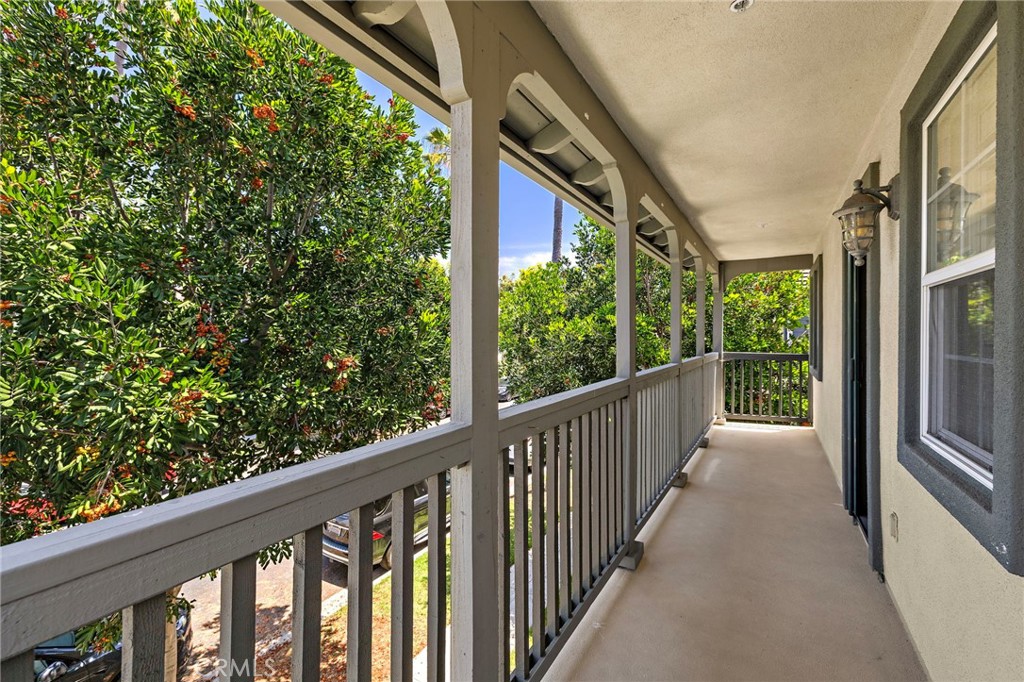 71 Sklar Street Ladera Ranch, CA 92694 - Photo 29 of 55 a view of a balcony with wooden floor