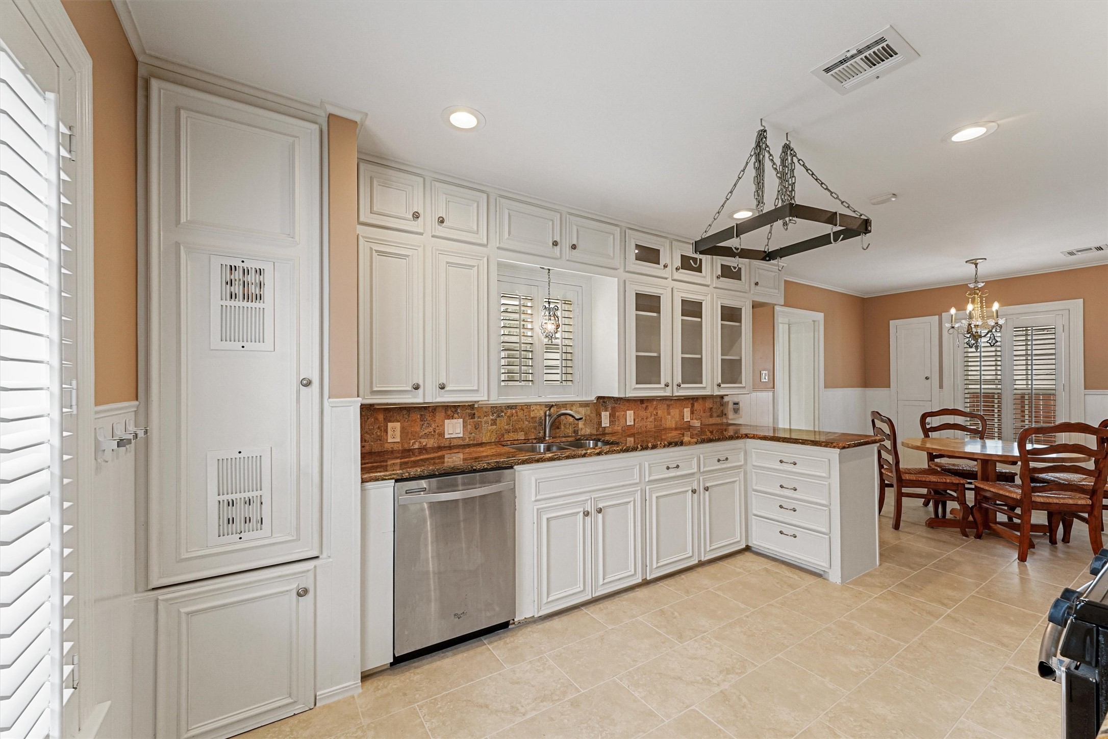 6645 Fairfield Street Houston, TX 77023 - Photo 16 of 28 a large white kitchen with a large window