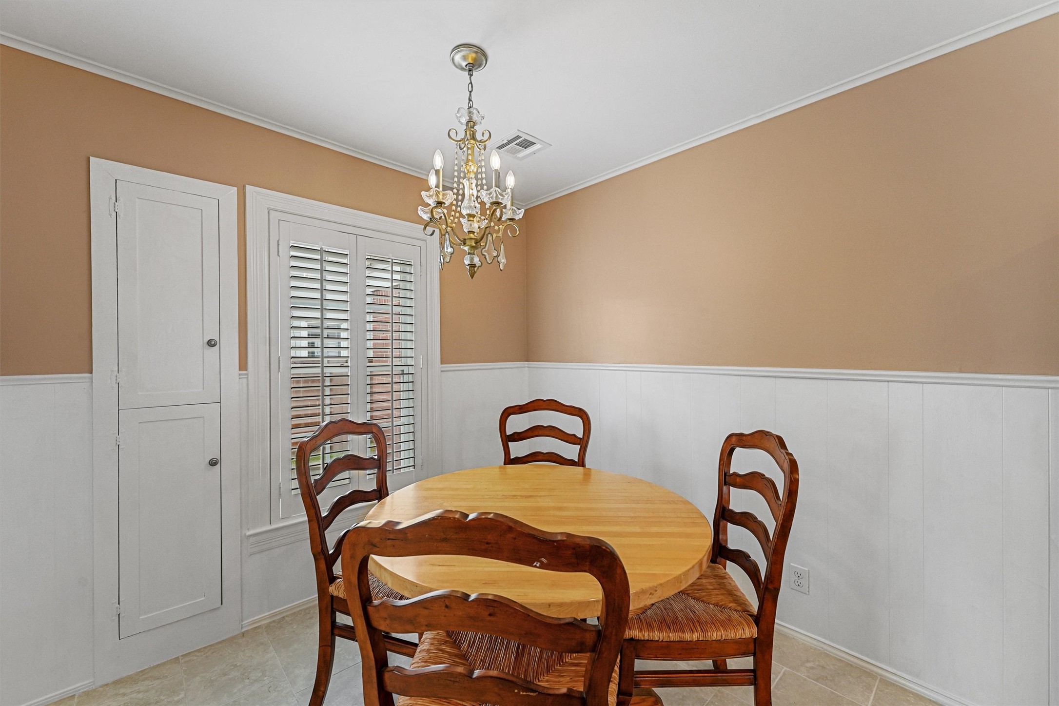 6645 Fairfield Street Houston, TX 77023 - Photo 19 of 28 a view of a dining room with furniture and chandelier
