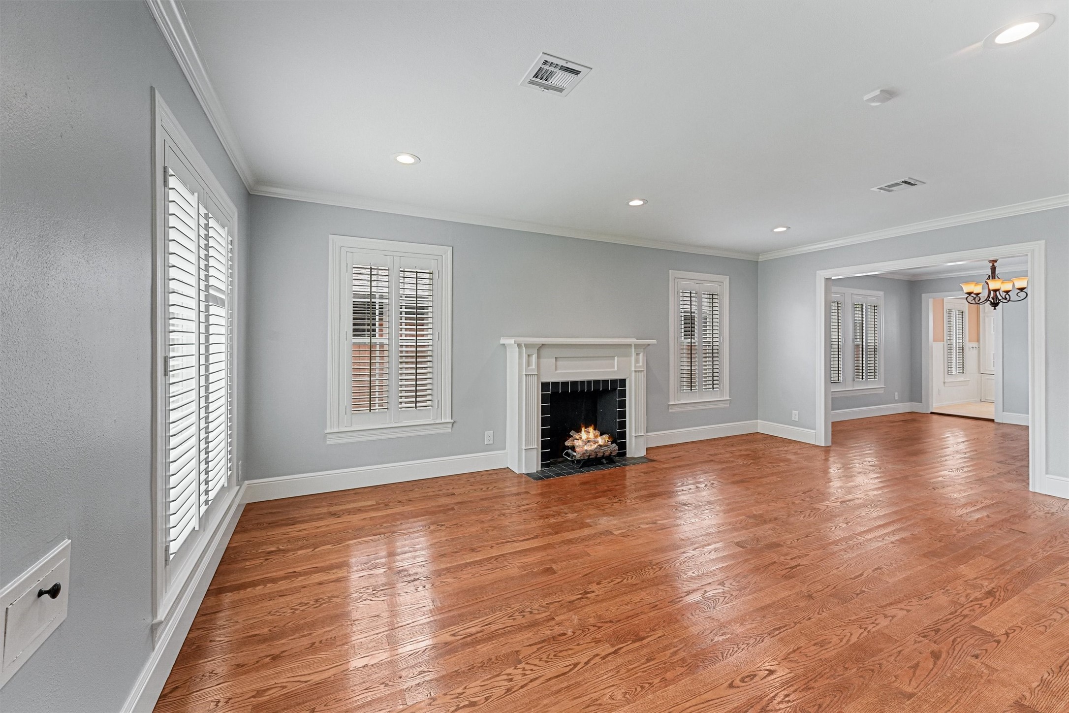 6645 Fairfield Street Houston, TX 77023 - Photo 6 of 28 a view of an empty room with window and fire place