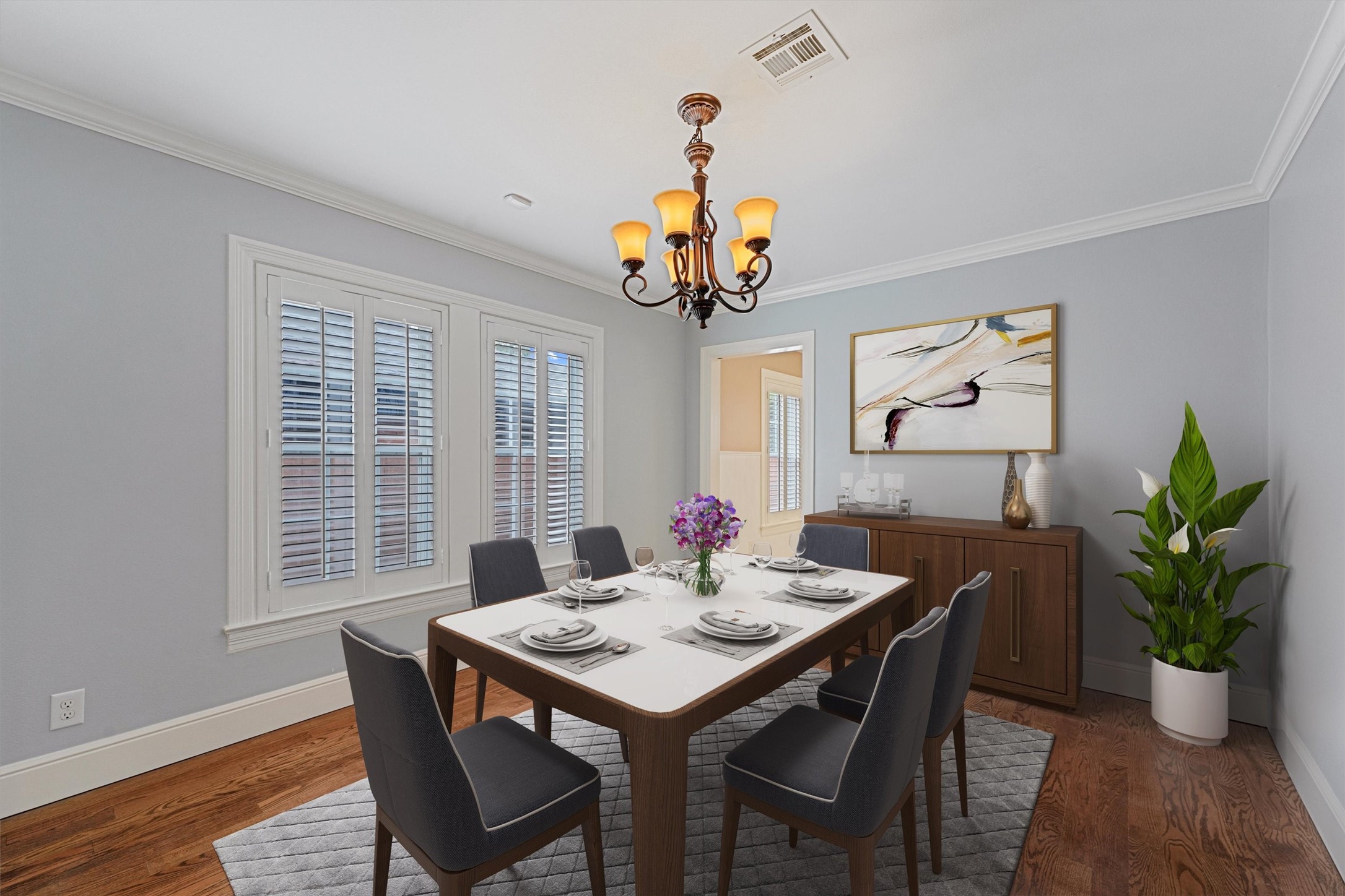 6645 Fairfield Street Houston, TX 77023 - Photo 10 of 28 a view of a dining room with furniture window and wooden floor
