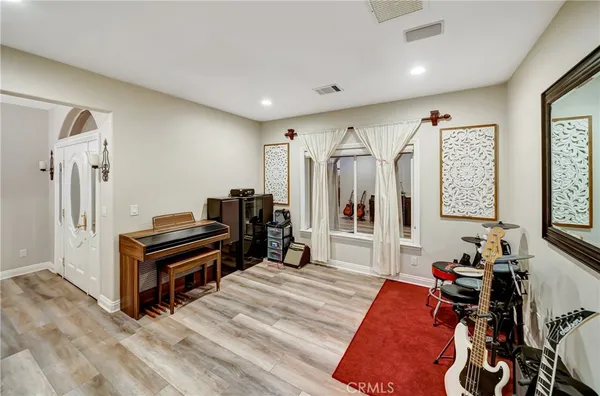 a kitchen with granite countertop a sink and a stove