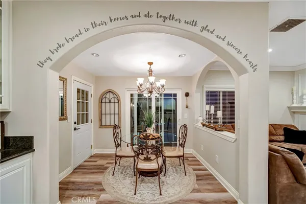 a view of a room with shelves on the wall