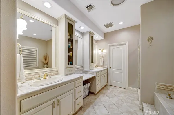 a view of living room with furniture and a flat screen tv