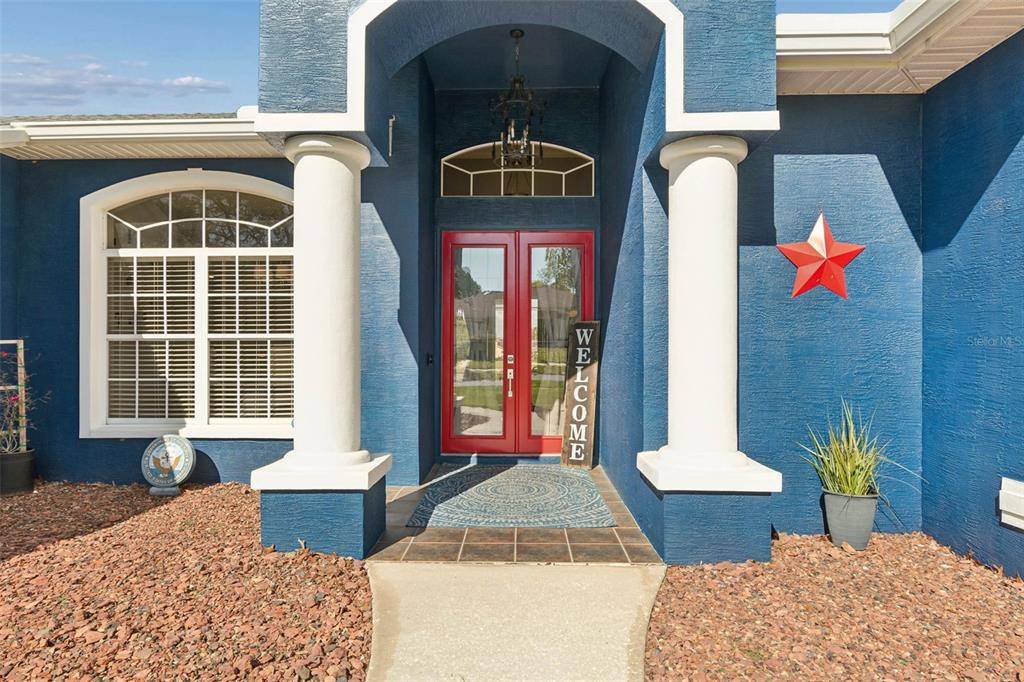 11017 Audie Brook Drive Spring Hill, FL 34608 - Photo 6 of 67 a front view of a house with outdoor space