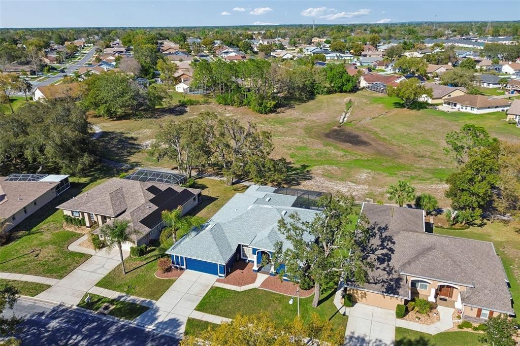 11017 Audie Brook Drive Spring Hill, FL 34608 - Photo 63 of 67 an aerial view of residential houses with outdoor space