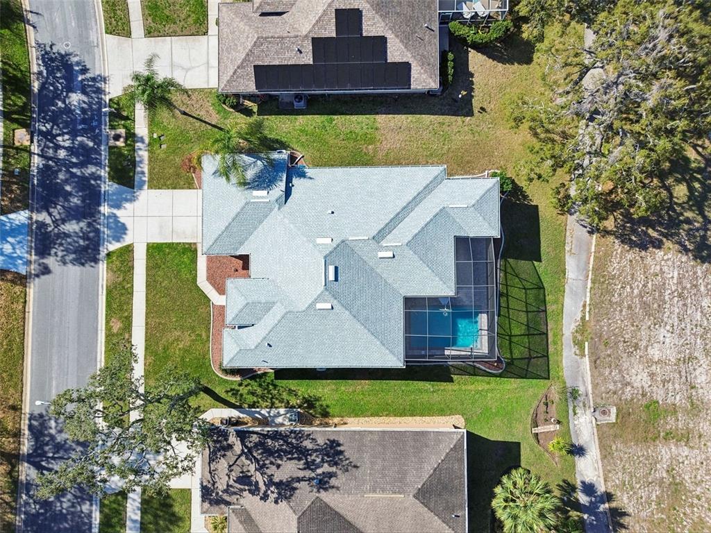 11017 Audie Brook Drive Spring Hill, FL 34608 - Photo 64 of 67 an aerial view of a house with a yard