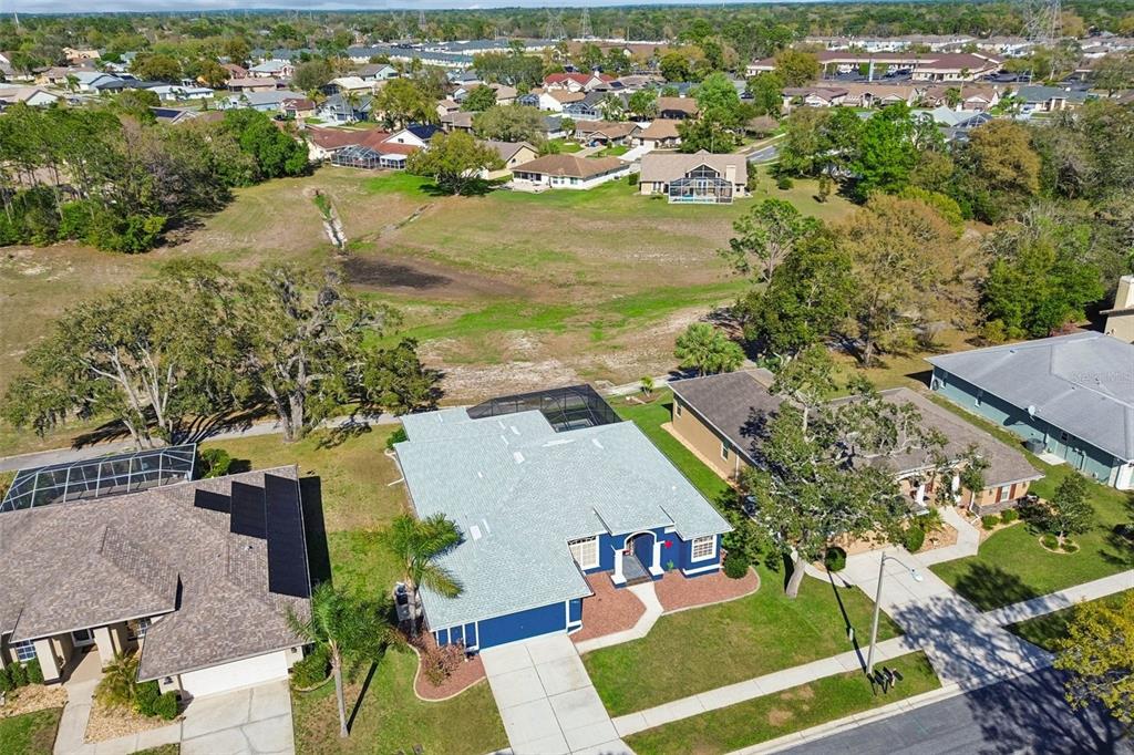 11017 Audie Brook Drive Spring Hill, FL 34608 - Photo 66 of 67 an aerial view of residential houses with outdoor space