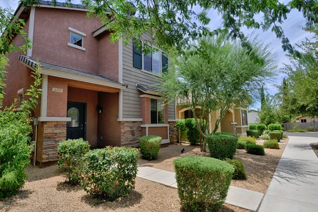 front view of a house with a yard