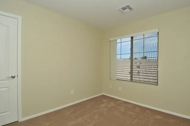 a bathroom with a sink a vanity and a mirror