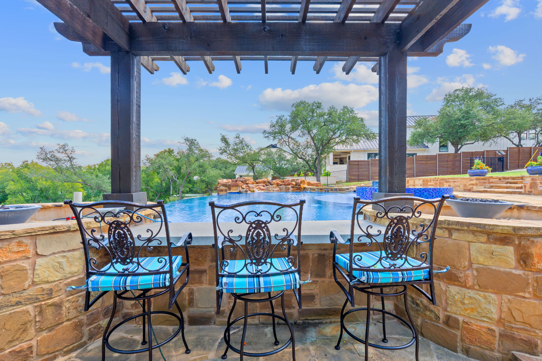 1325 Likeness Road Spicewood, TX 78669 - Photo 30 of 40 View of patio featuring a pergola and an outdoor pool