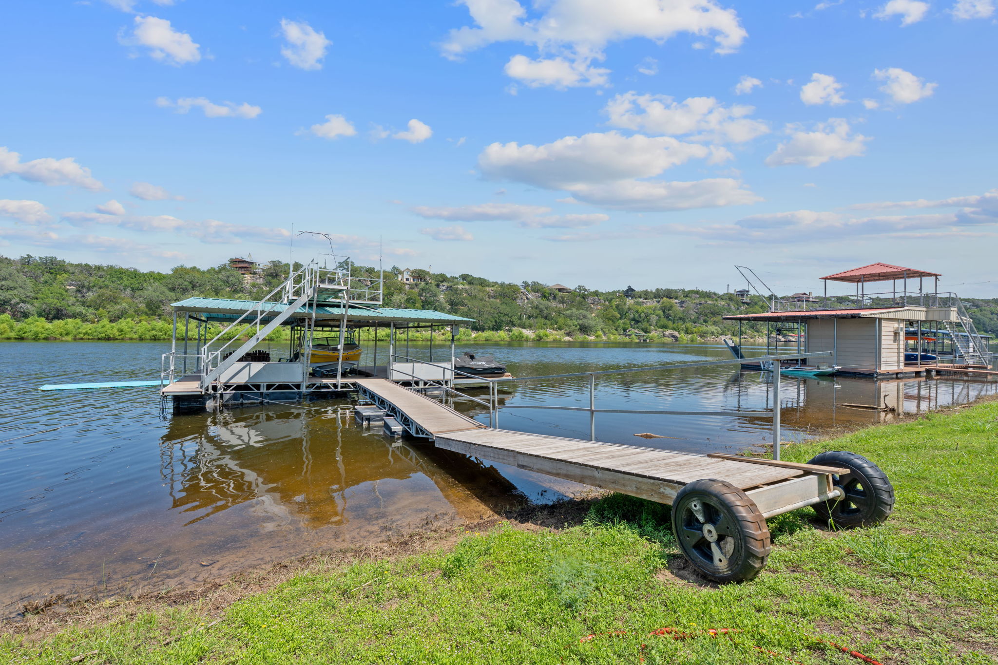 1325 Likeness Road Spicewood, TX 78669 - Photo 31 of 40 Dock area with a water view and boat lift