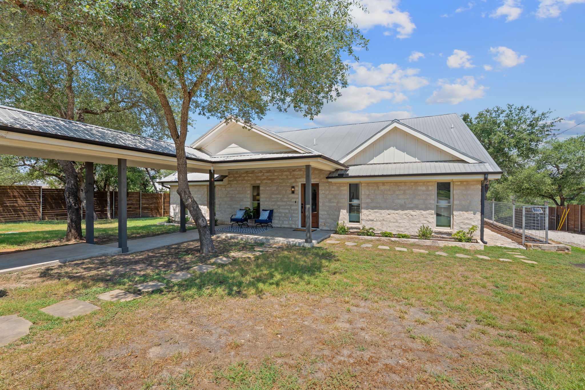 1325 Likeness Road Spicewood, TX 78669 - Photo 36 of 40 View of front of house with a porch