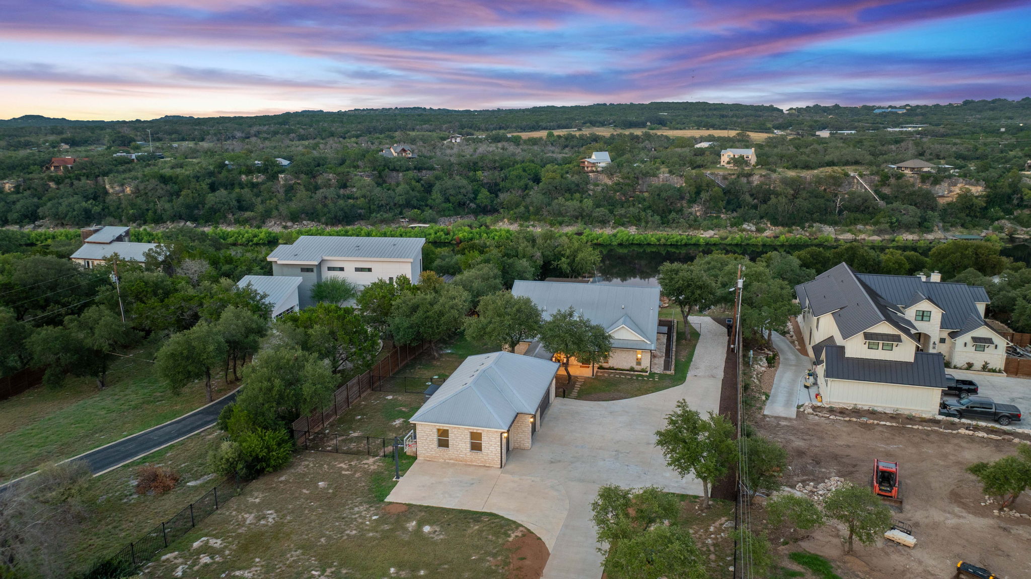 1325 Likeness Road Spicewood, TX 78669 - Photo 37 of 40 Aerial view at dusk of a residential view