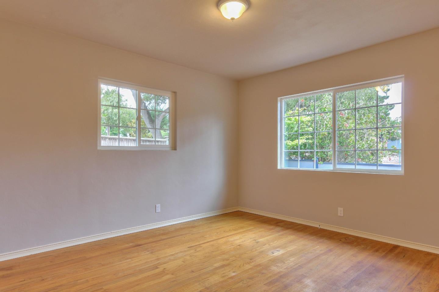 612 Sunset Drive Pacific Grove, CA 93950 - Photo 24 of 37 an empty room with a window