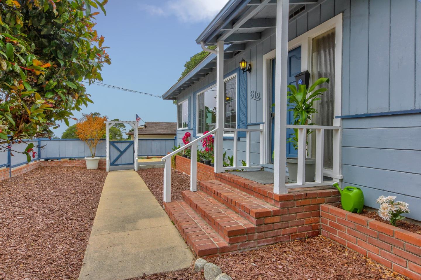 612 Sunset Drive Pacific Grove, CA 93950 - Photo 3 of 37 a front view of a house with porch