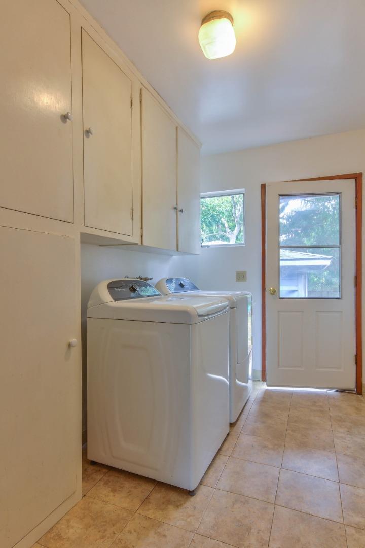 612 Sunset Drive Pacific Grove, CA 93950 - Photo 31 of 37 a utility room with washer and dryer