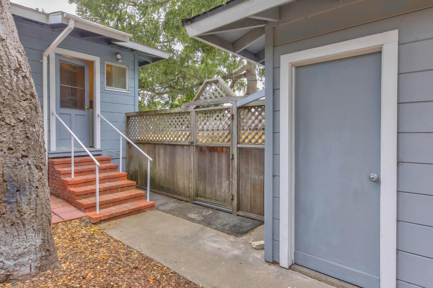 612 Sunset Drive Pacific Grove, CA 93950 - Photo 34 of 37 a view of wooden house with a front door