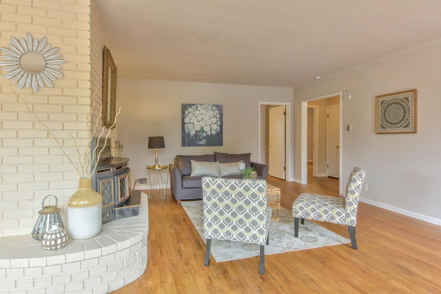 612 Sunset Drive Pacific Grove, CA 93950 - Photo 7 of 37 a living room with furniture and wooden floor