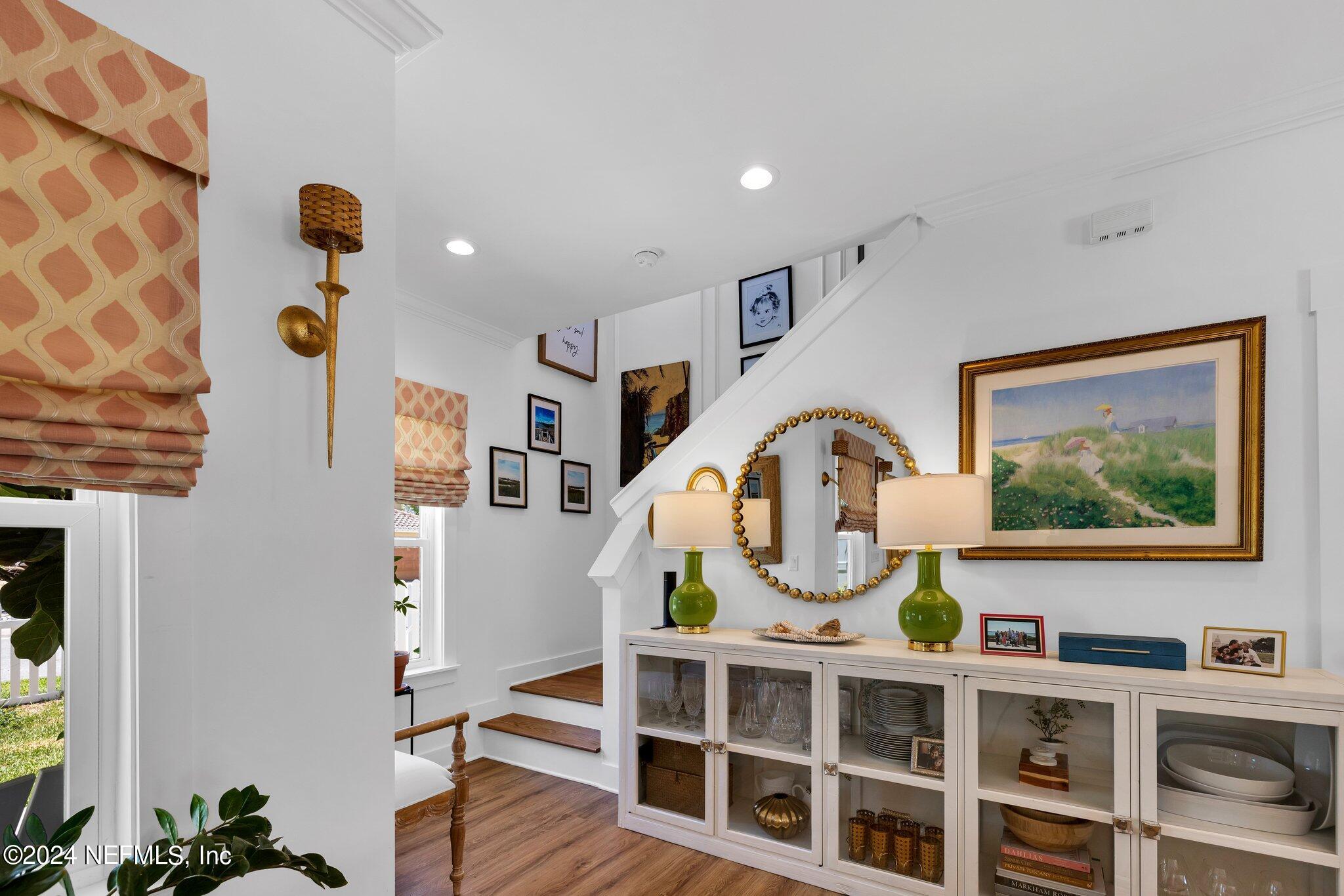 6825 A Ave Street St. Augustine, FL 32080 - Photo 15 of 53 a view of a entryway with furniture and wooden floor