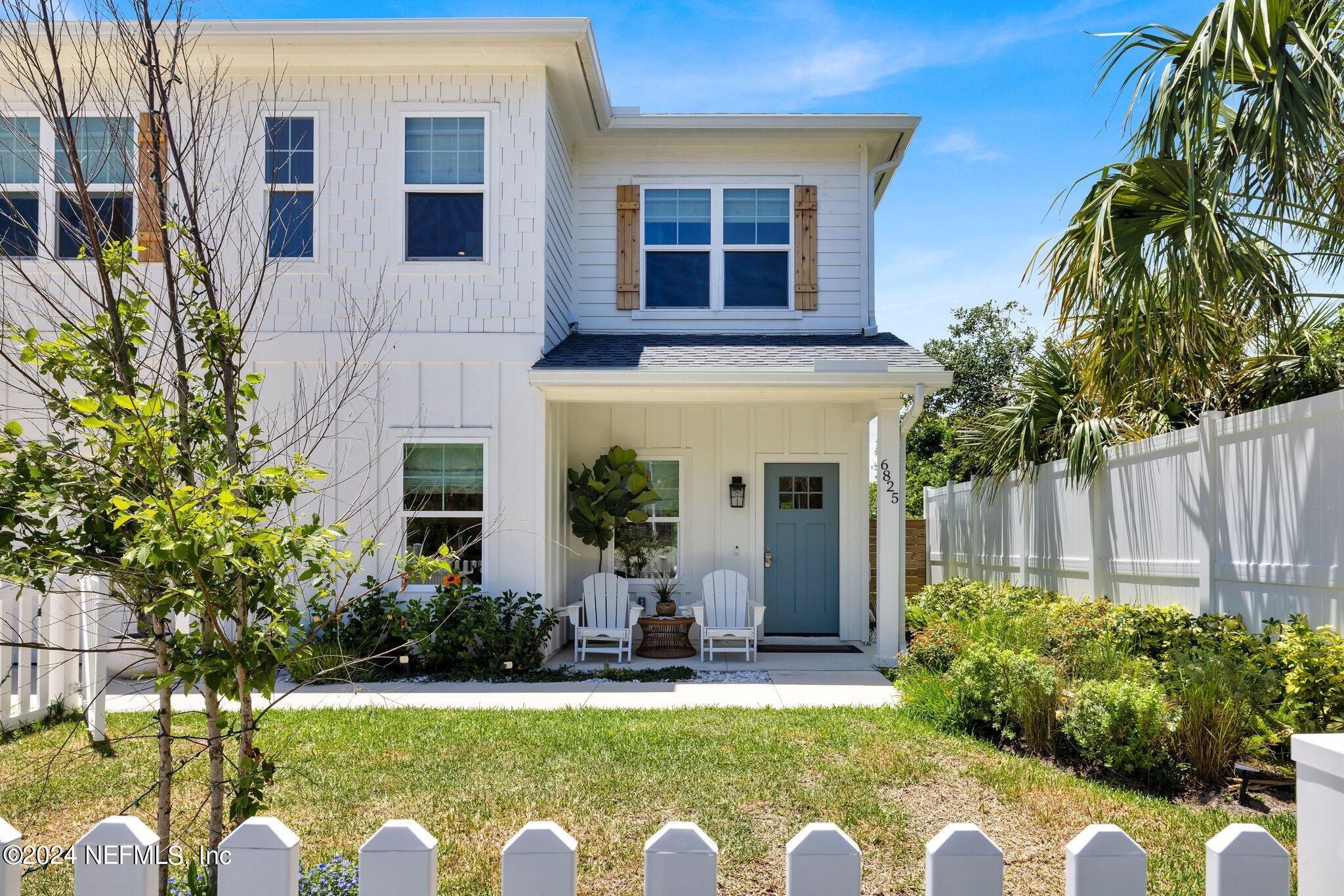 6825 A Ave Street St. Augustine, FL 32080 - Photo 3 of 53 a front view of a house with a yard