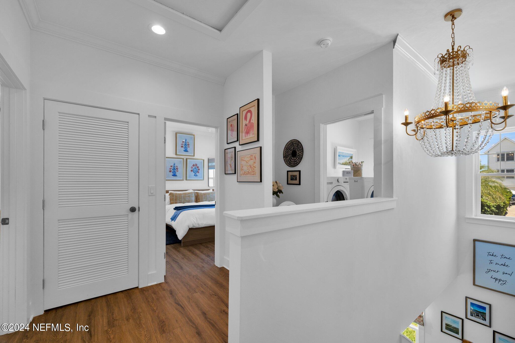 6825 A Ave Street St. Augustine, FL 32080 - Photo 32 of 53 a view of living room with furniture and wooden floor