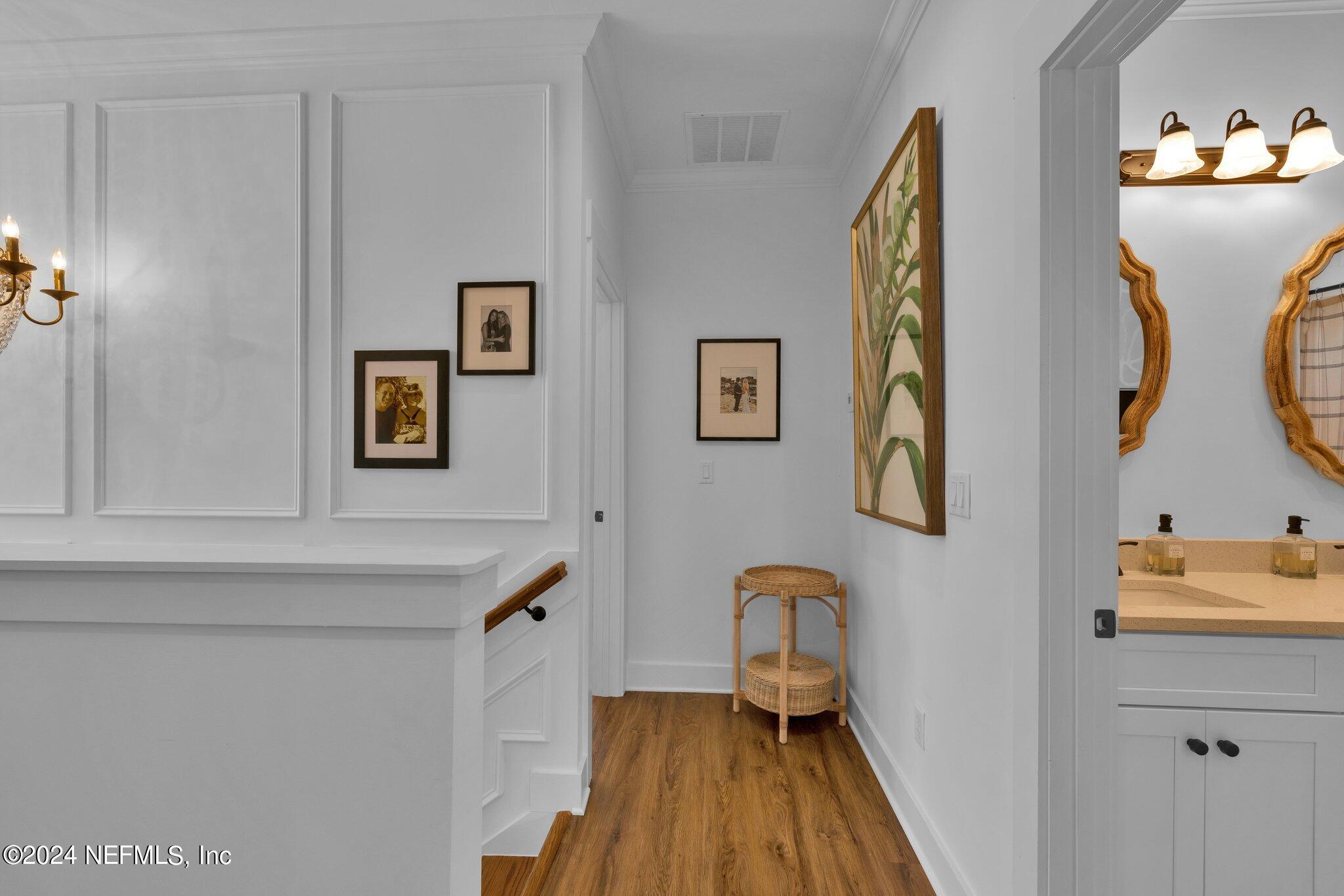 6825 A Ave Street St. Augustine, FL 32080 - Photo 33 of 53 a bathroom with a sink and a mirror