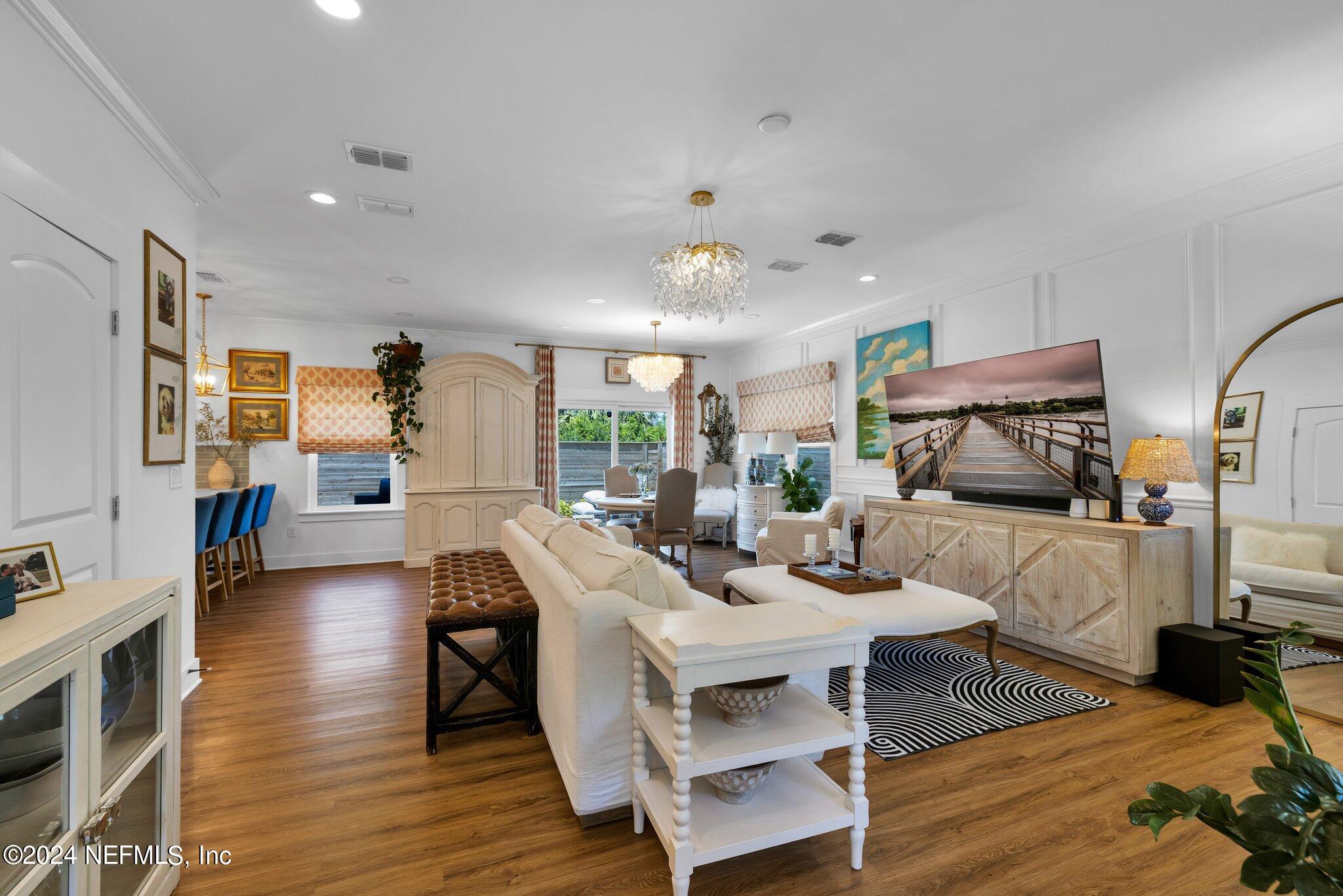 6825 A Ave Street St. Augustine, FL 32080 - Photo 9 of 53 a living room with furniture and a wooden floor