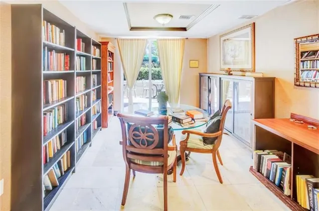 a view of a hallway view with living room
