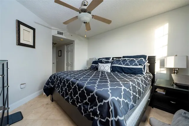 a bathroom with a toilet sink and shower