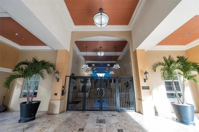 a room with furniture and a chandelier