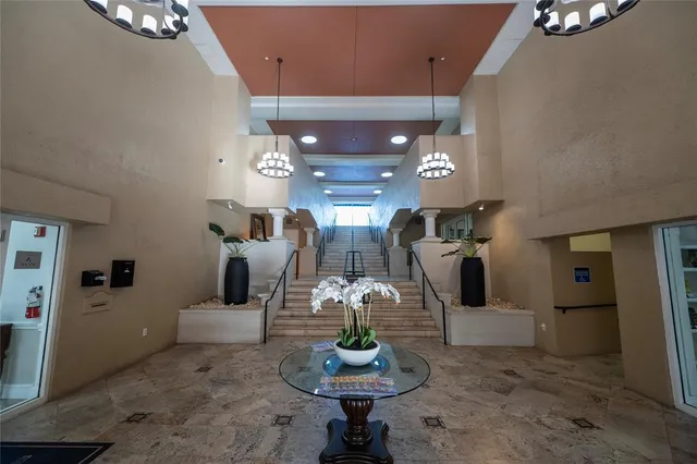 a view of a swimming pool and lounge chair