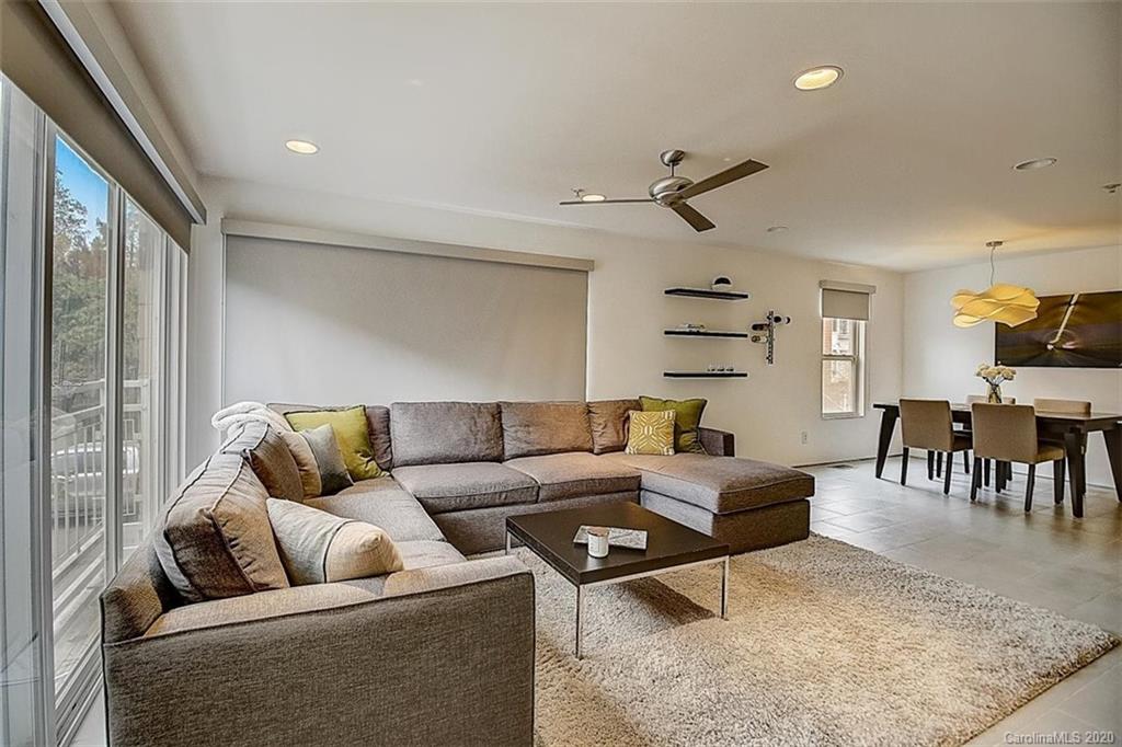 652 Raphael Place Charlotte, NC 28205 - Photo 2 of 26 a living room with furniture and a table