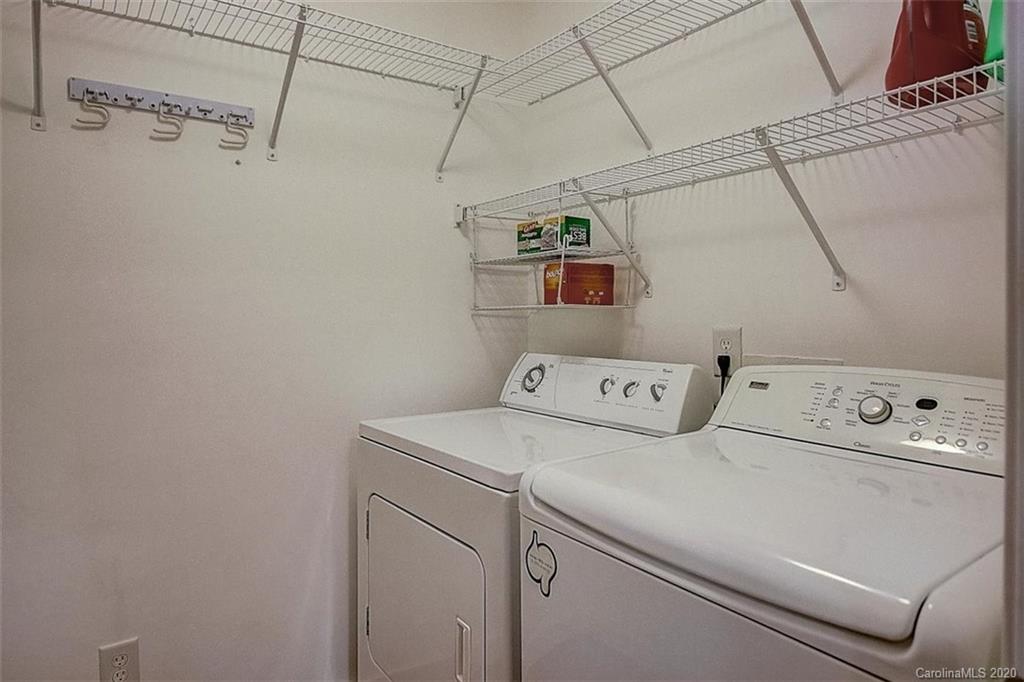 652 Raphael Place Charlotte, NC 28205 - Photo 18 of 26 a utility room with dryer and washer