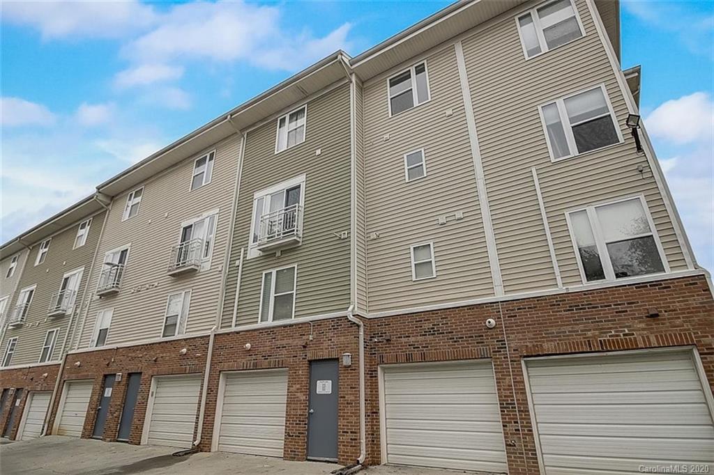 652 Raphael Place Charlotte, NC 28205 - Photo 21 of 26 a front view of a house with many windows