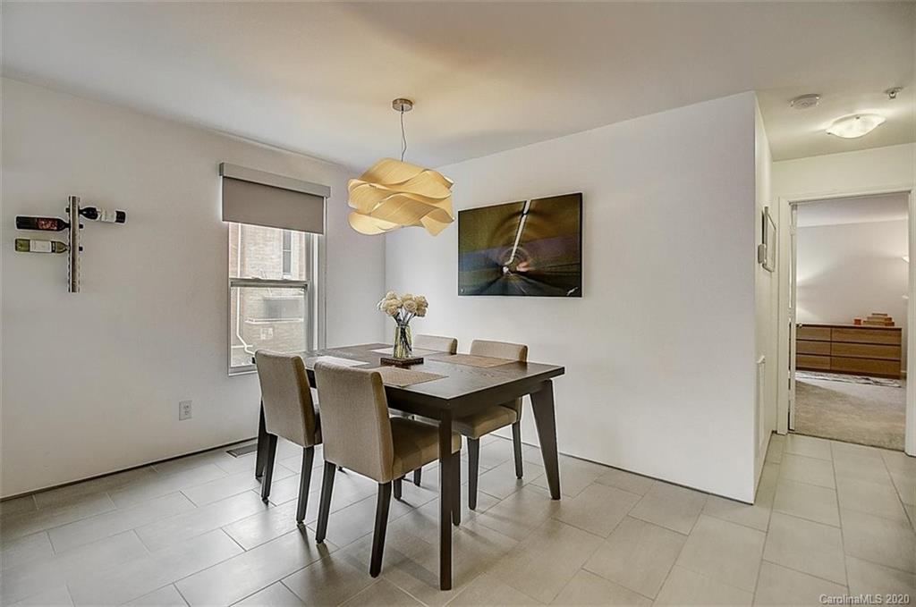 652 Raphael Place Charlotte, NC 28205 - Photo 5 of 26 a view of a dining room with furniture