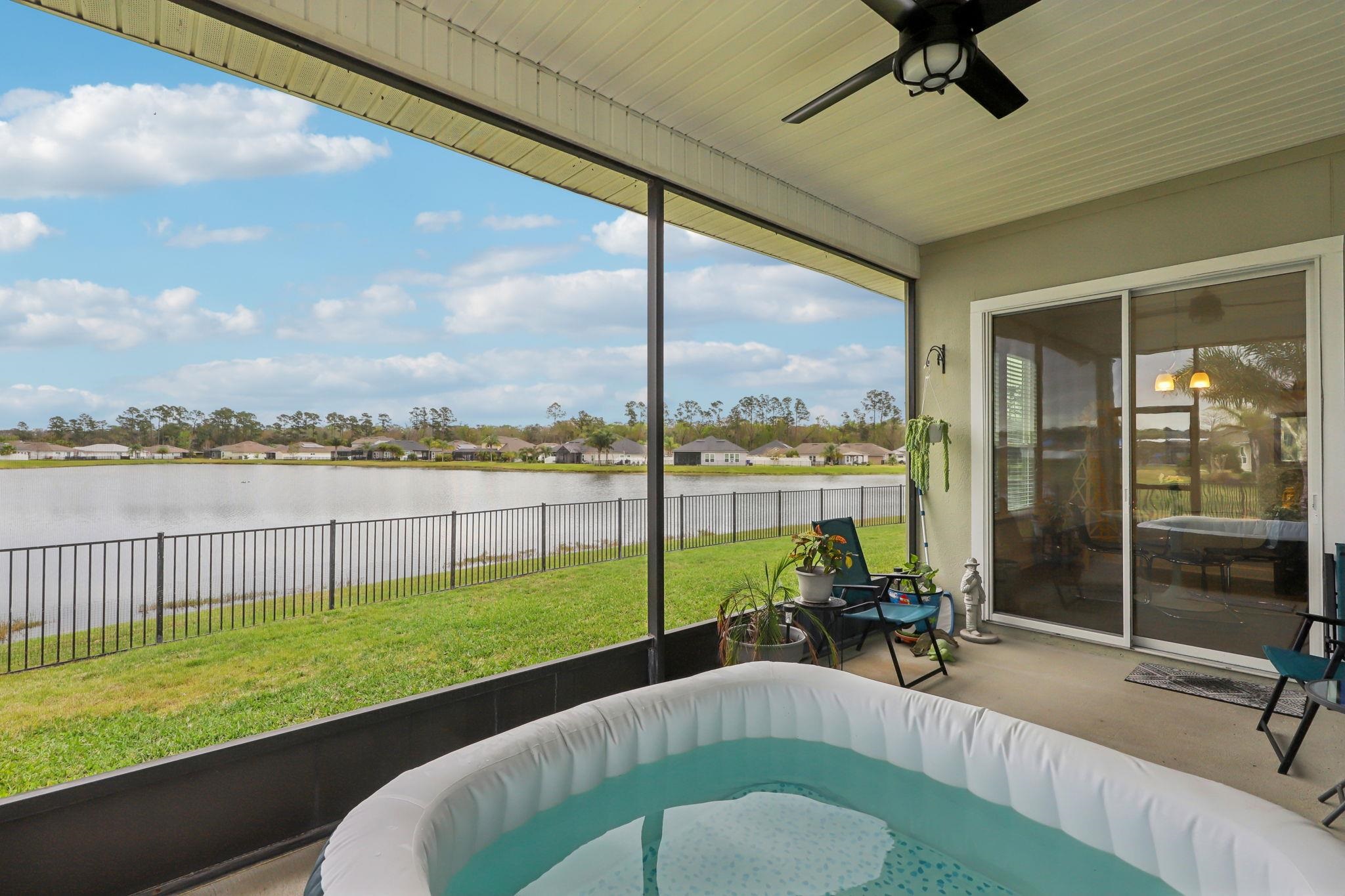 443 Sweet Mango Trail St. Augustine, FL 32086 - Photo 34 of 54 a view of a patio with a yard