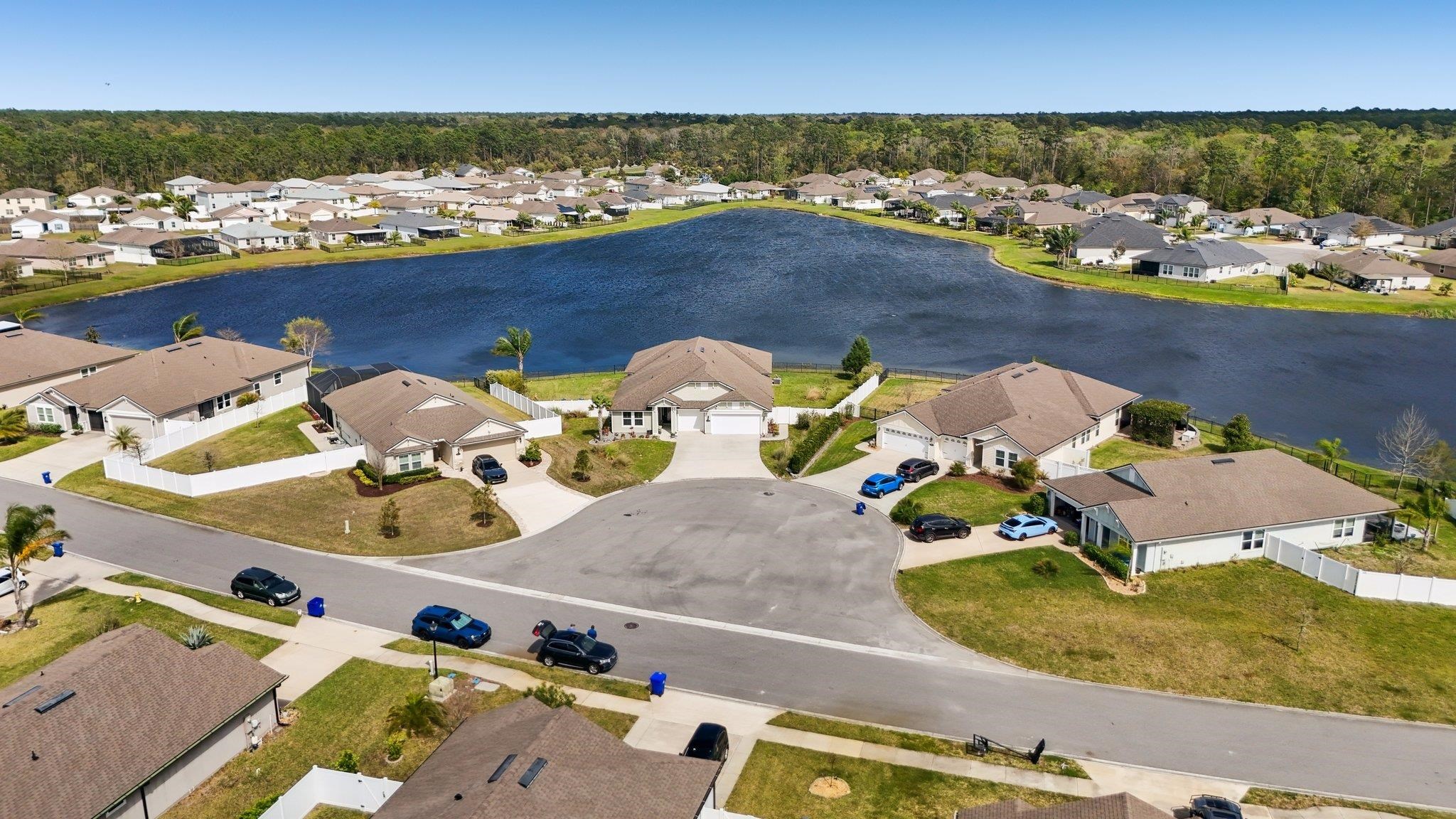 443 Sweet Mango Trail St. Augustine, FL 32086 - Photo 47 of 54 an aerial view of a house with a swimming pool yard and outdoor seating