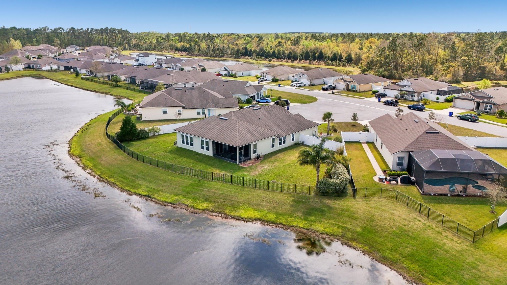 443 Sweet Mango Trail St. Augustine, FL 32086 - Photo 53 of 54 an aerial view of a house with a garden