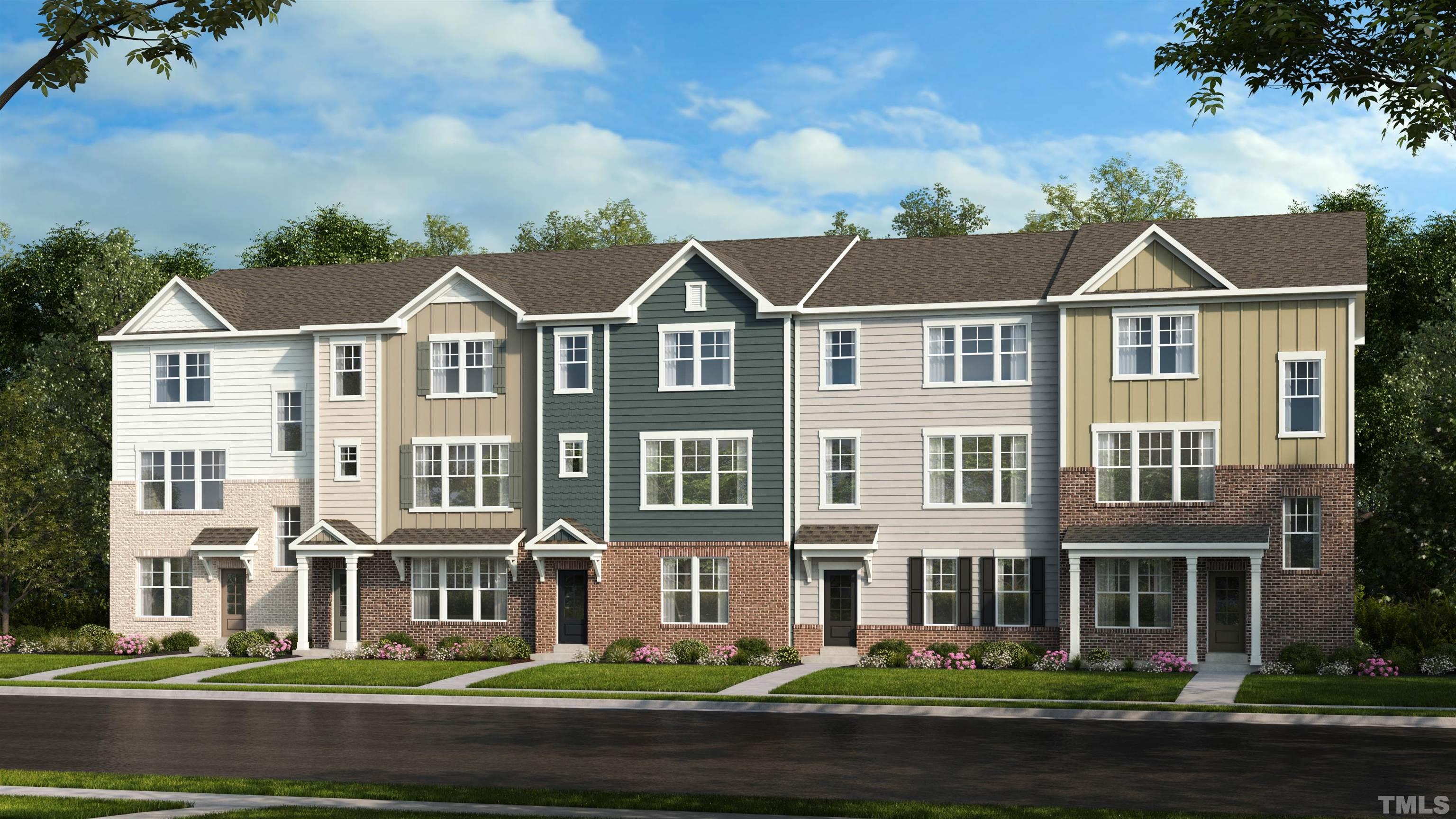 6944 Leesville Road, Unit 12 Raleigh, NC 27613 - Photo 1 of 11 a front view of residential houses with yard