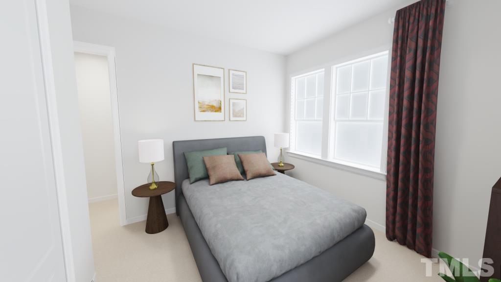 6944 Leesville Road, Unit 12 Raleigh, NC 27613 - Photo 9 of 11 a bed room with a bed and a window