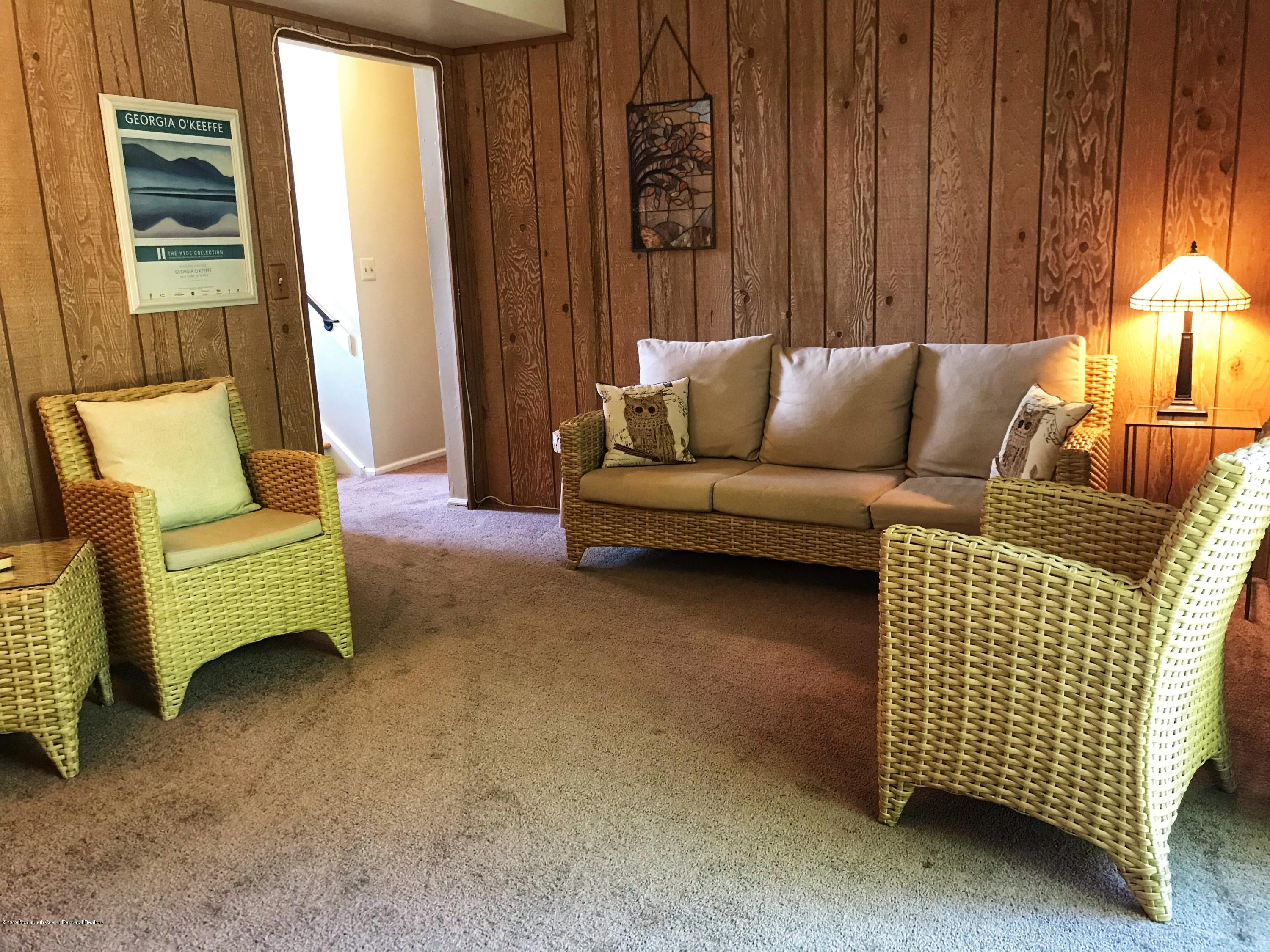 7 Hendrickson Place Fair Haven, NJ 07704 - Photo 15 of 26 FAMILY ROOM WITH SLIDING DOOR TO DECK