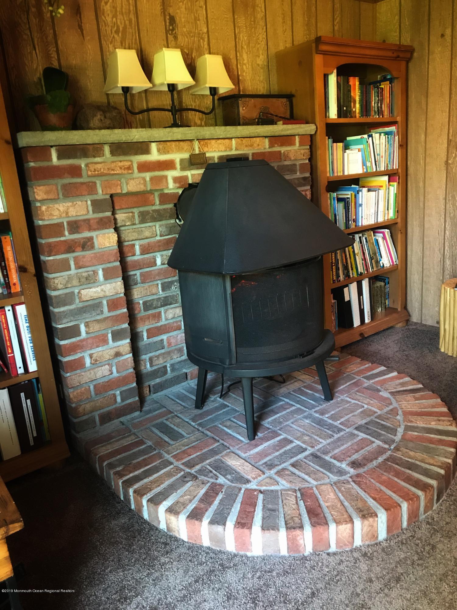 7 Hendrickson Place Fair Haven, NJ 07704 - Photo 25 of 26 FAMILY ROOM FIREPLACE
