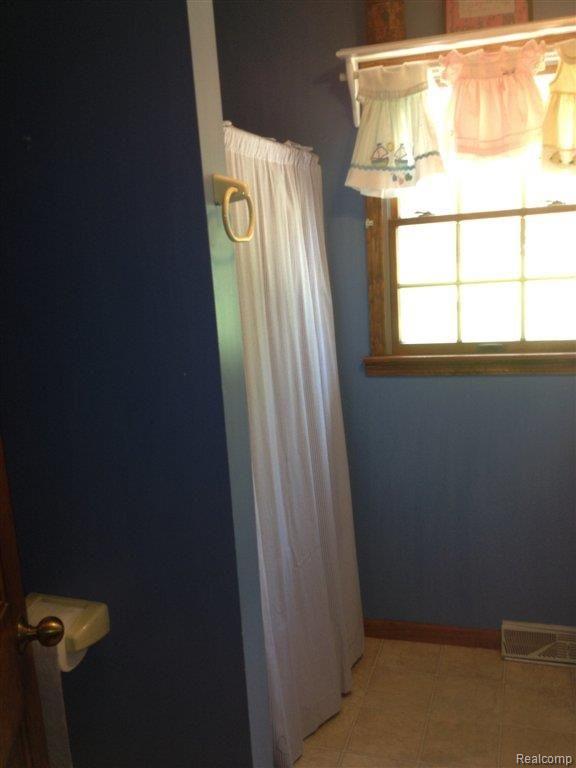 4954 Pinckney Road Howell, MI 48843 - Photo 18 of 20 Bath in Laundry room.JPG