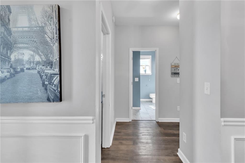 4044 Amberleigh Trace Gainesville, GA 30507 - Photo 12 of 22 a view of a hallway with wooden floor