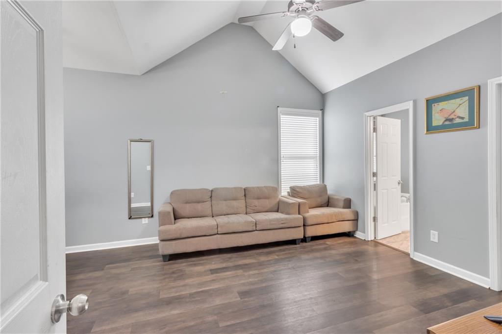 4044 Amberleigh Trace Gainesville, GA 30507 - Photo 18 of 22 a living room with furniture and a large window